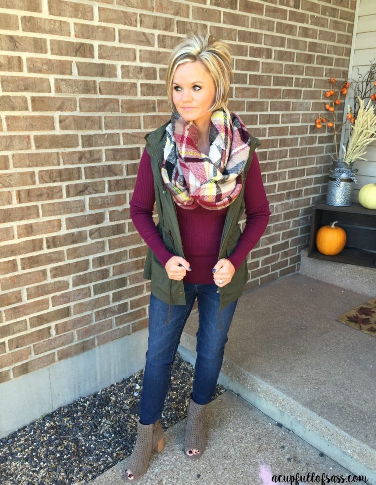 Thanksgiving Outfit Ideas. Maroon shirt with plaid blanket scarf.