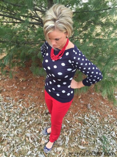 Navy Polka Dot sweater with red jeans outfit.