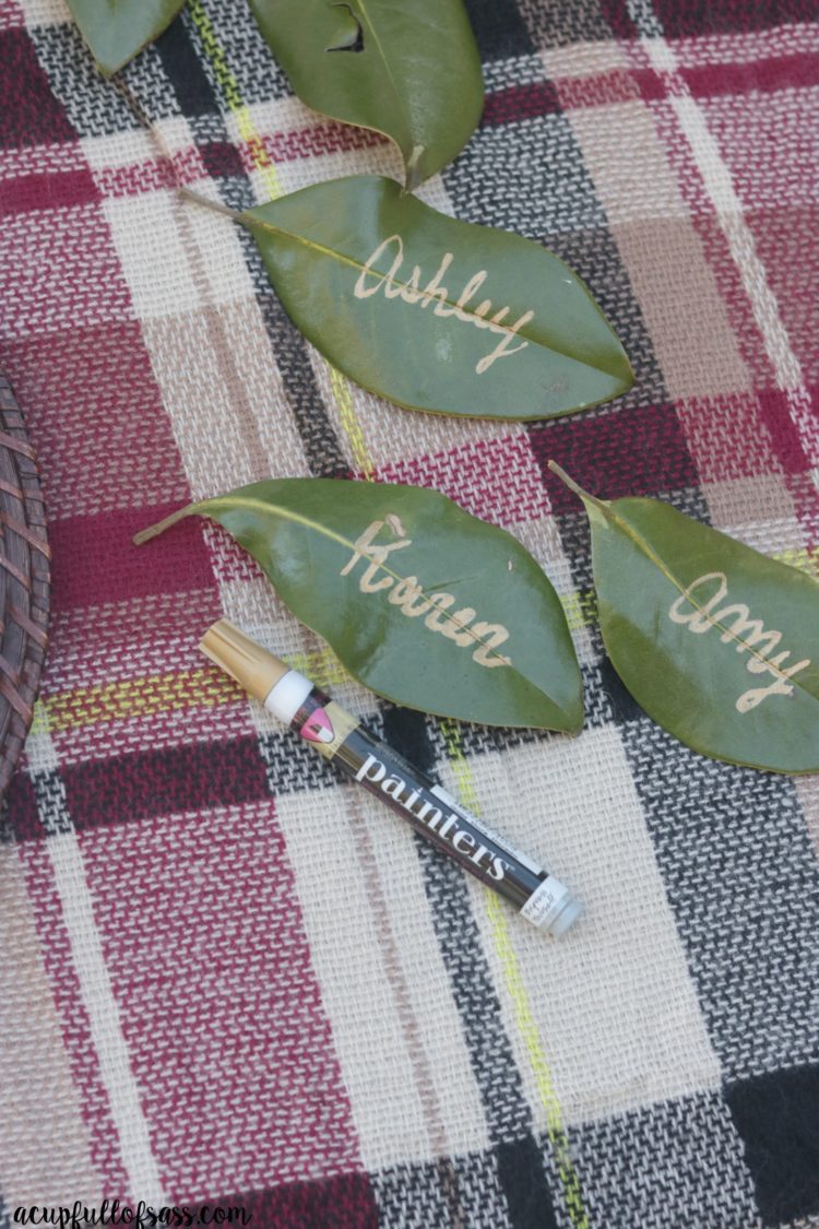 DIY Leaf Place Cards for Thanksgiving. These Magnolia leaves added the perfect touch. I think Joanna Gaines would approve - A Cup Full of Sass 