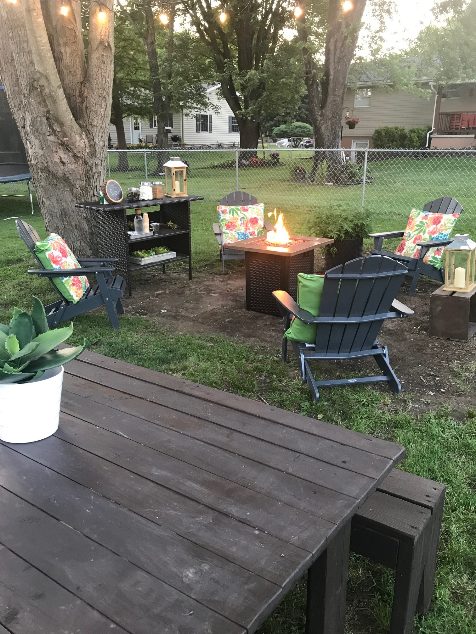 How to hang outdoor string lights. Create an outdoor oasis in your backyard for summer.