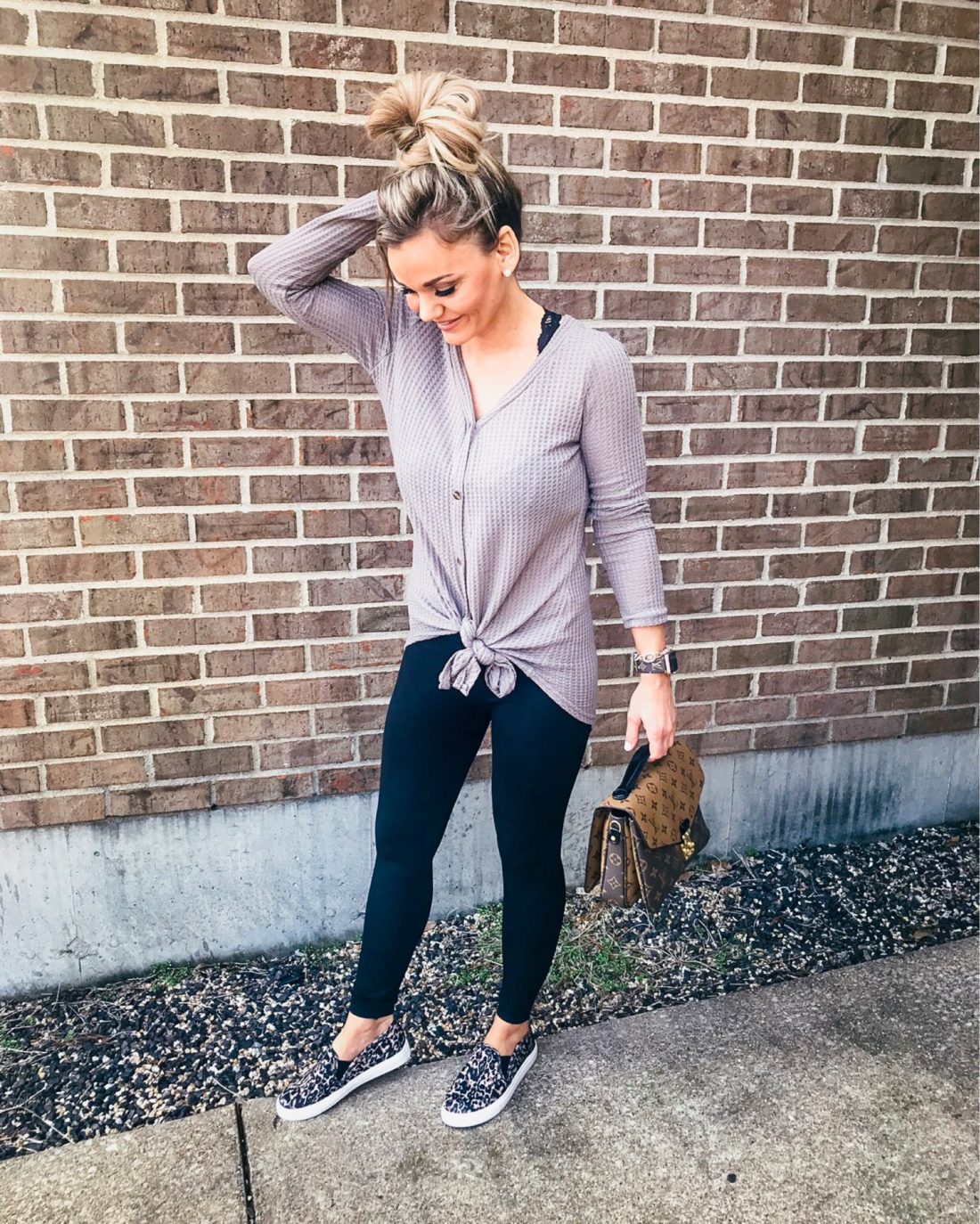 Casual outfit for spring. Henley front knot tie top from Amazon, leggings and leopard shoes.