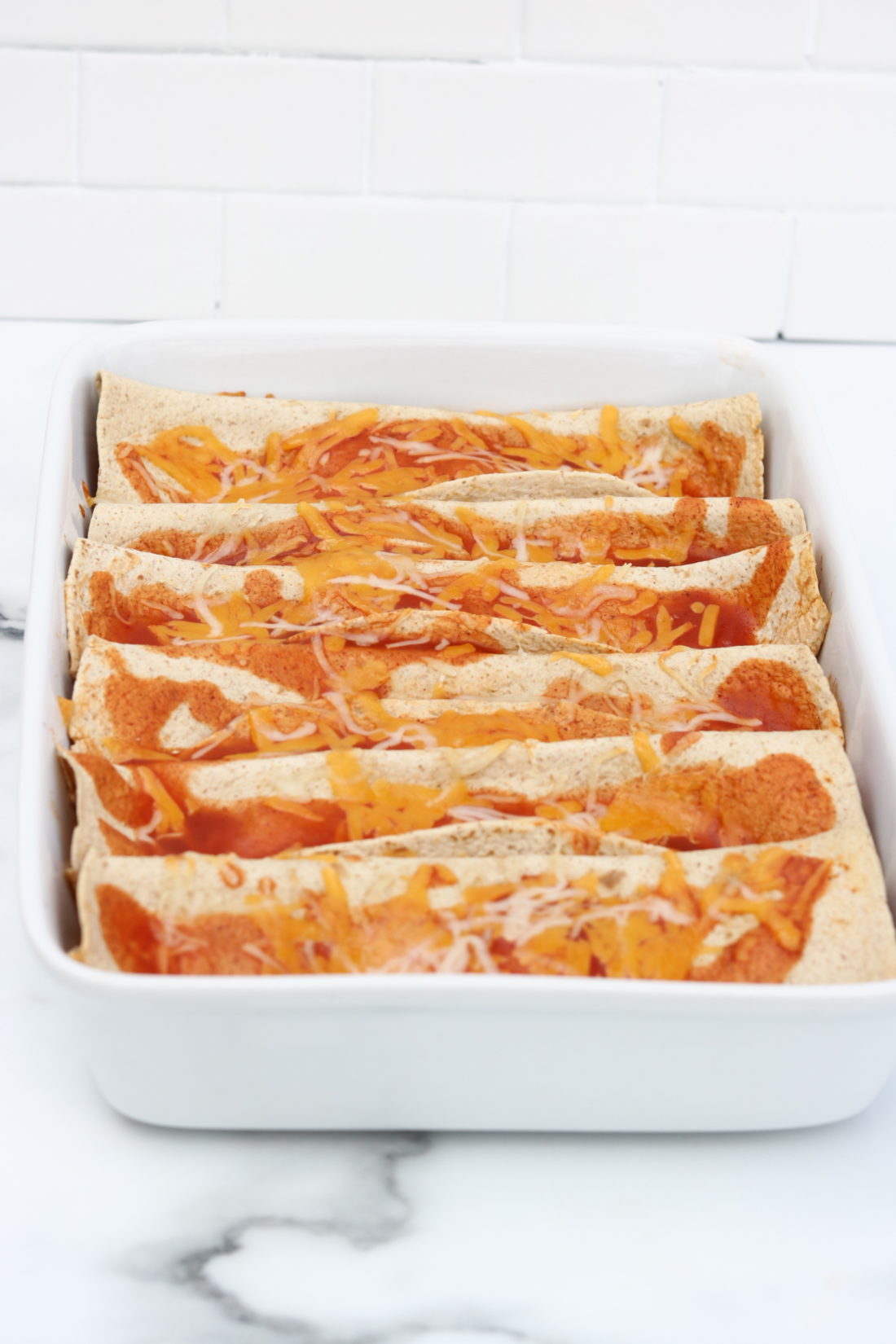 These easy Low Carb Chicken Enchiladas are made in the instant pot.