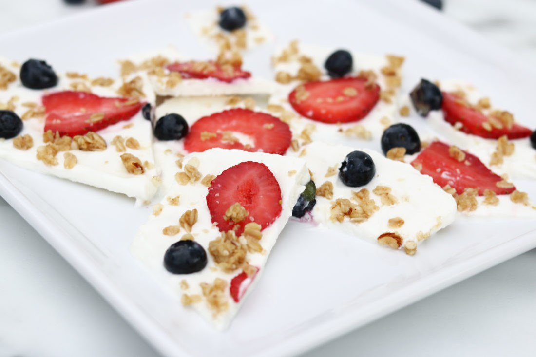 Frozen Yogurt Bark with Fruit. Strawberries, blueberries and granola make this a healthy treat.
