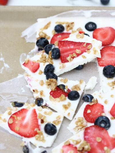 Frozen Yogurt Bark with Fruit. Strawberries, blueberries and granola make this a healthy treat.