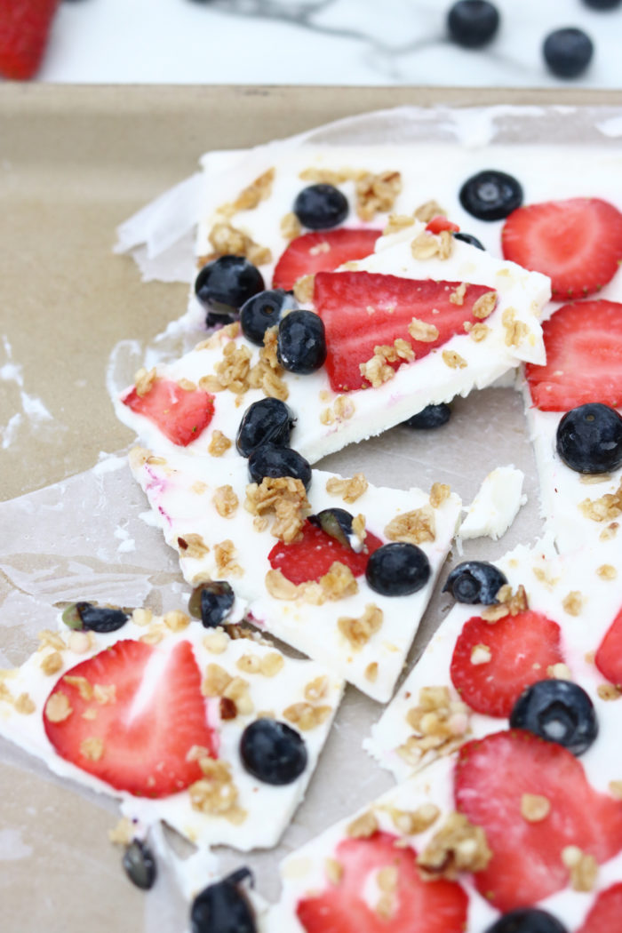 Frozen Yogurt Bark with Fruit. Strawberries, blueberries and granola make this a healthy treat.