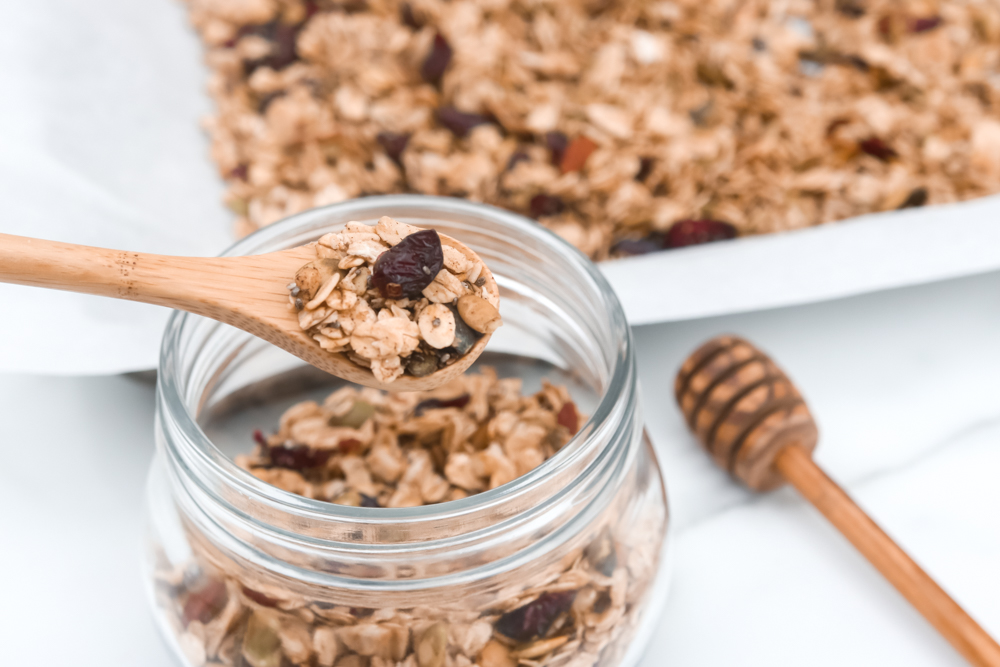 Easy Homemade Healthy Granola. A combination of oats, nuts, seeds, cranberries, vanilla, cinnamon, and maple syrup.