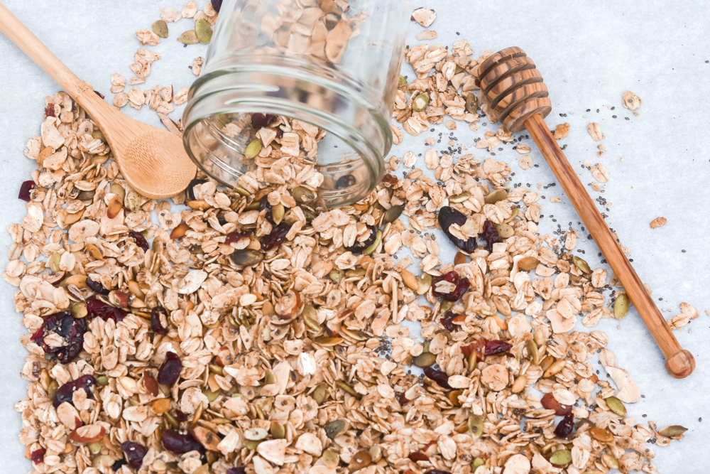 Homemade Healthy Granola. A combination of oats, nuts, seeds, cranberries, vanilla, cinnamon, and maple syrup.