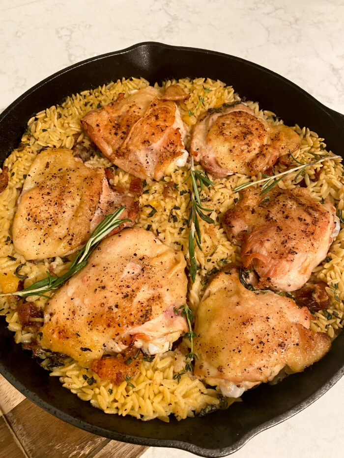 One skillet Chicken Thighs with Orzo and dates.